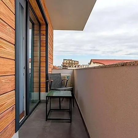 Apartahotel Sarmihouse
